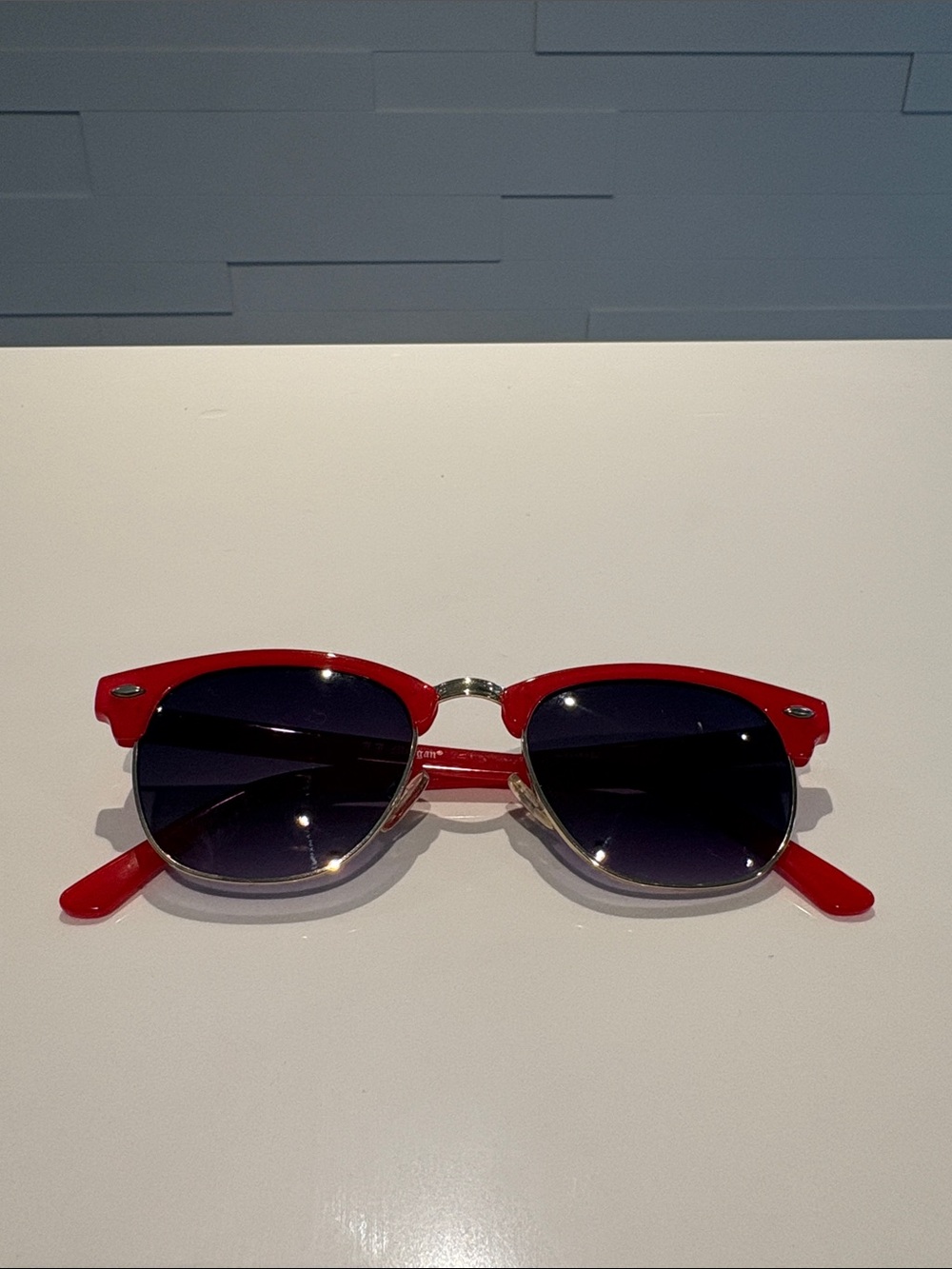 AJ Morgan sunglasses with red frame
